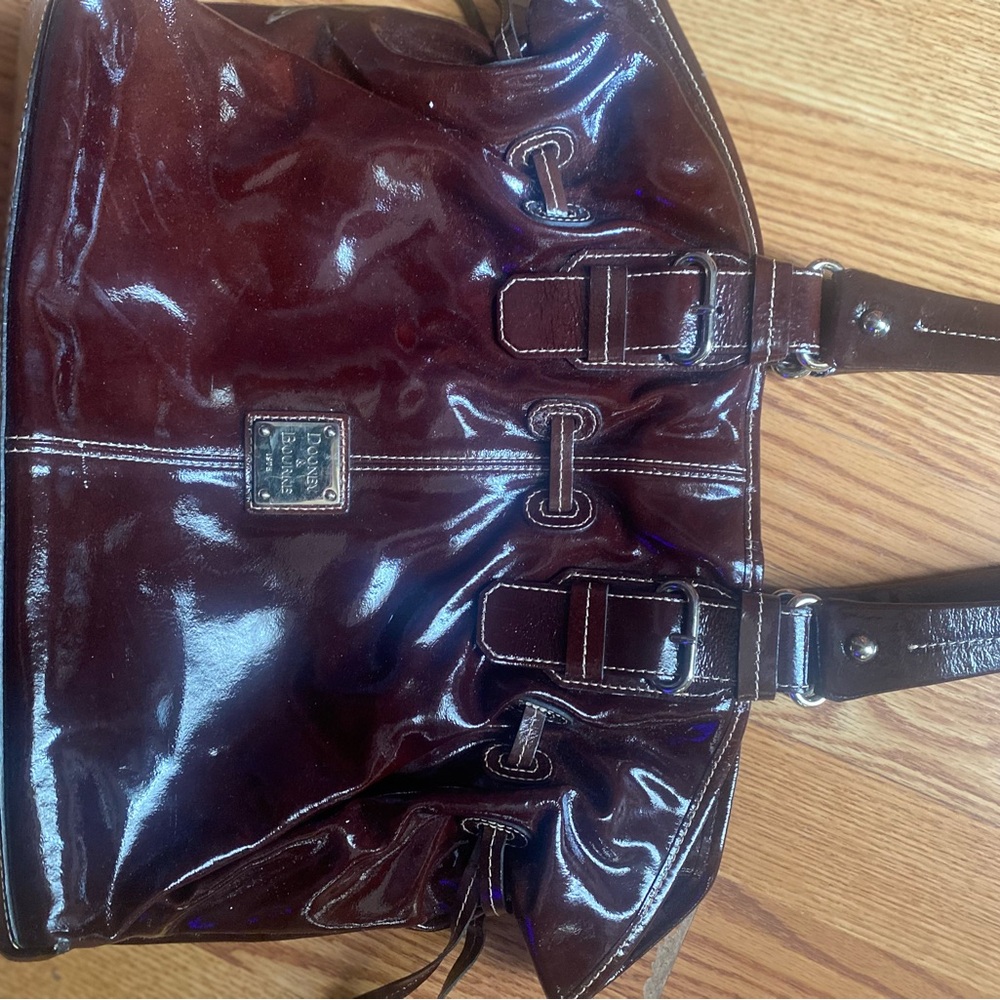 The bag is in good condition, the front strap has minor defects-see pictures.